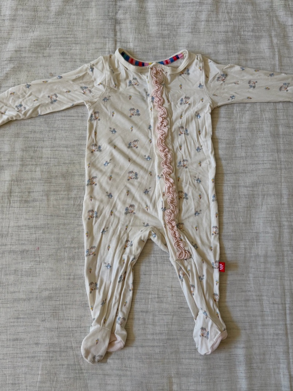 Magnetic Me Cream Footed One-Piece with Pink Ruffle Trim
